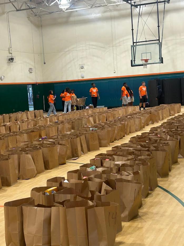 Long rows of filled paper bags stretching across the McArthur High School gym floor